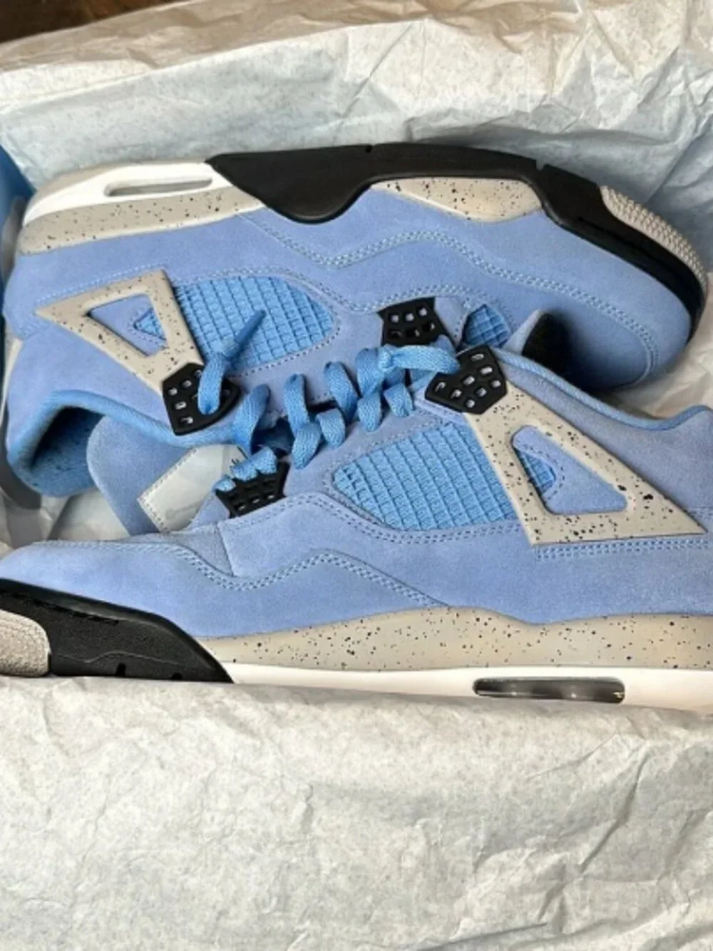 Jordan 4 Retro University Blue Sneakers